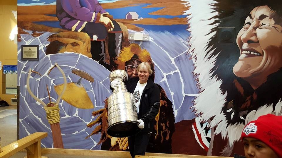 Phil Pritchard, the keeper of the Cup, brings the Stanley Cup out at the stop in Cambridge Bay. Photo courtesty of Project North Facebook group