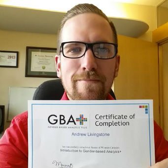 Andrew Livingstone poses with his completion certificate.