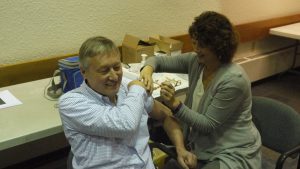 NWT Chief Public Health Officer Dr. André Corriveau receives his flu shot in Yellowknife Wednesday morning.